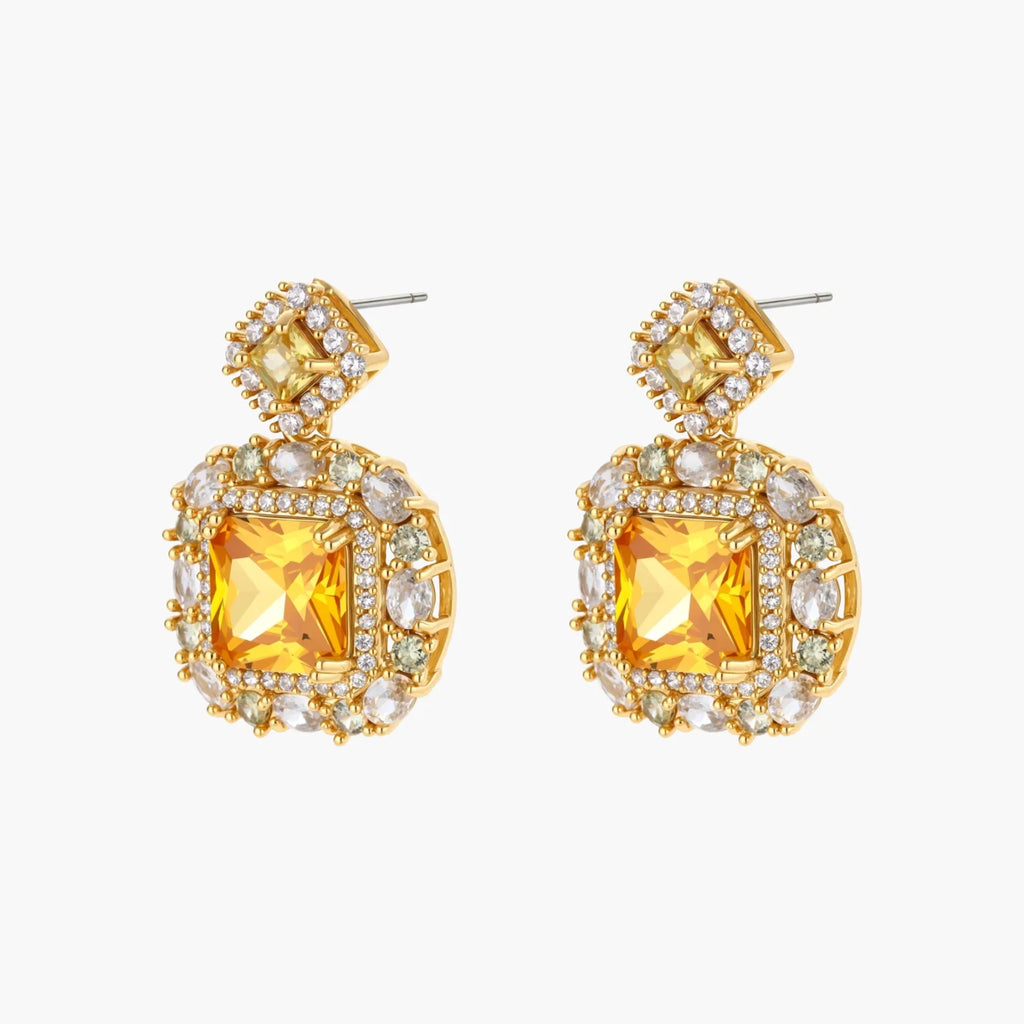 14K gold-plated jewelry set featuring square-cut cubic zirconia stones in ornate layered settings on white background.