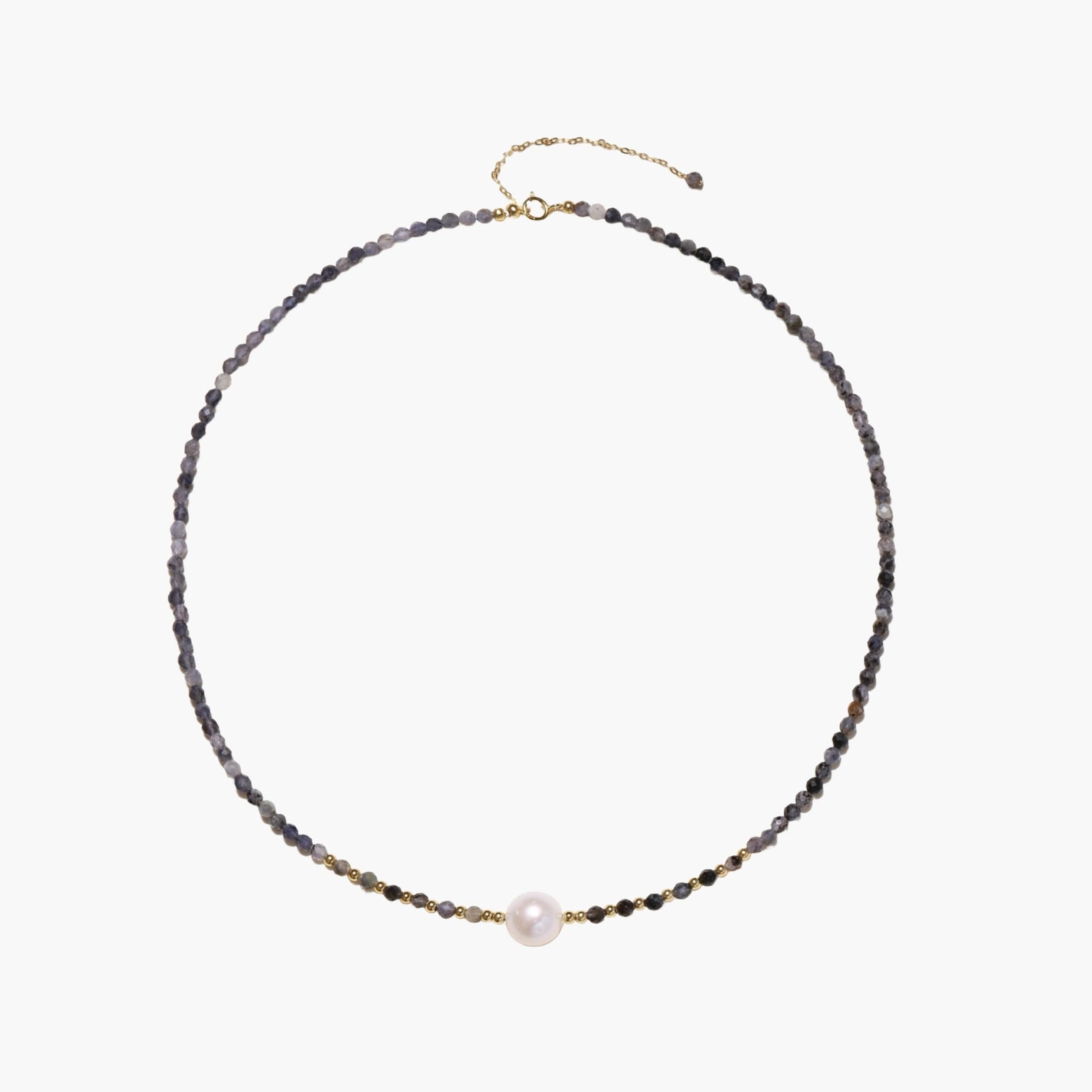 Dainty necklace with faceted purple iolite beads, gold vermeil accents, and central pink-white freshwater pearl.
