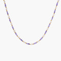 Delicate 18K gold vermeil necklace with alternating lavender zirconia beads and white freshwater pearls on cream background